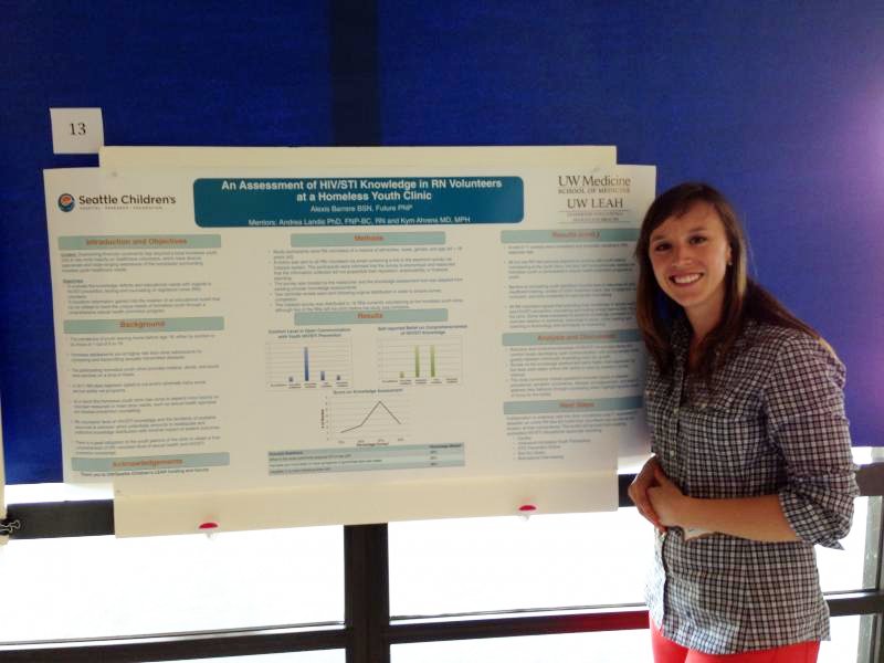 A trainee presents her research.